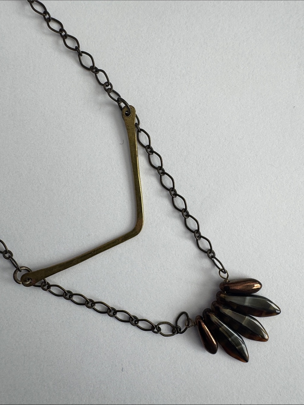 Delicate Bronze 31” Necklace with Brown Tortoise Colored and Metallic Teardrop